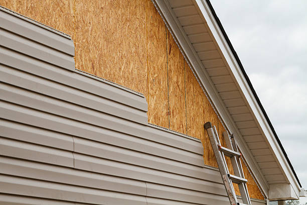Professional Emergency Siding Repair technician working in Ocean Beach, NY
